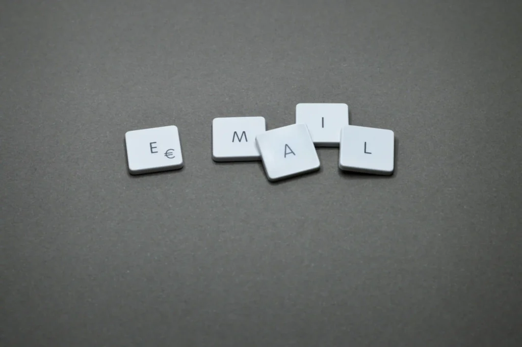 Email spelled with white keys on a black background, symbolizing digital communication and email marketing strategies